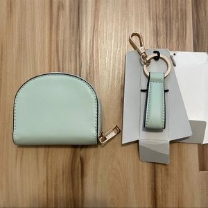 A new day coin purse and keychain set